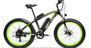 cyrusher xf660 electric fat bike in black and green colour scheme