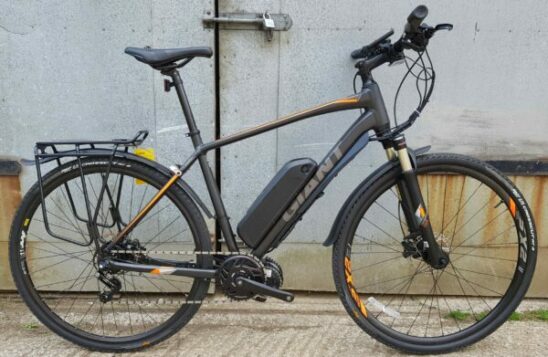 roam géant équipé d'une conversion électrique bafang mid drive