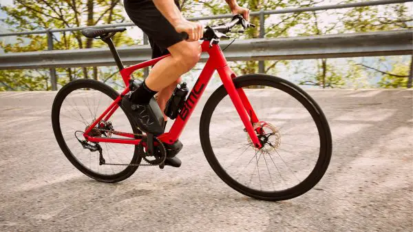 7 of the Best Flat Bar Electric Road Bikes 11 bmc alpenchallenge sport one ebike being ridden