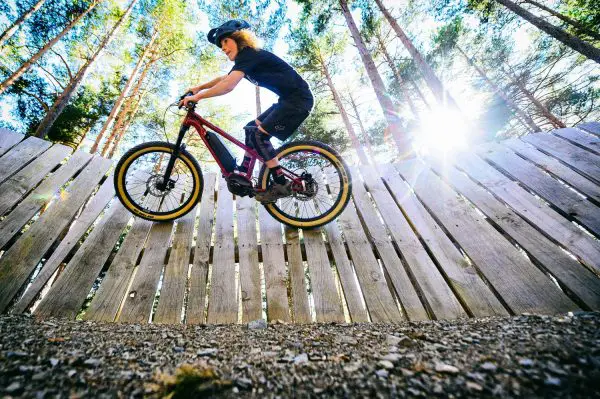 child riding an e-bike