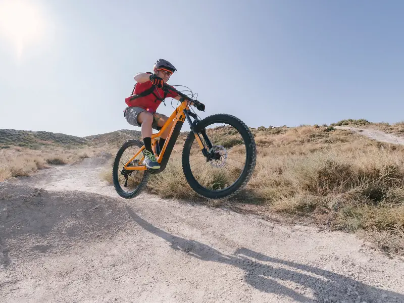 electric mountain bike being ridden off road