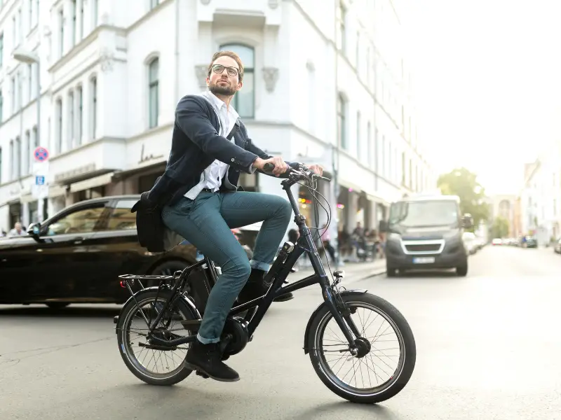 man riding an electric bike