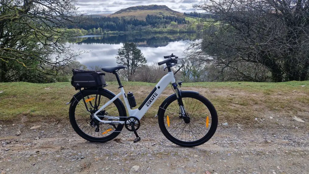 step through e-bike by a lake